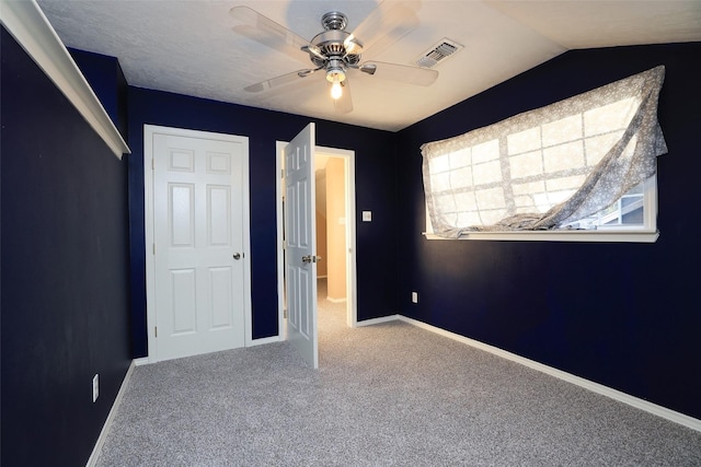 9130 Kirkleigh St, Spring, TX 77379 - unfurnished bedroom featuring carpet floors, baseboards, and a ceiling fan