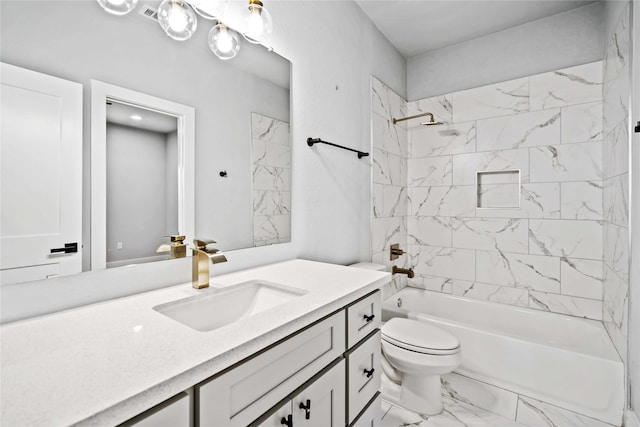 full bathroom featuring toilet, vanity, and tiled shower / bath