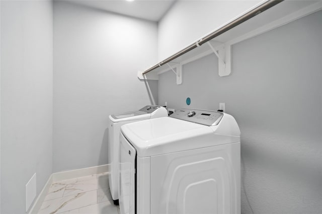 washroom with washer and clothes dryer