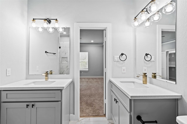 bathroom with vanity and ornamental molding