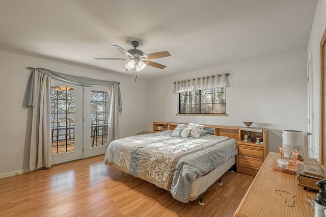 bedroom with light wood-type flooring, access to outside, and ceiling fan