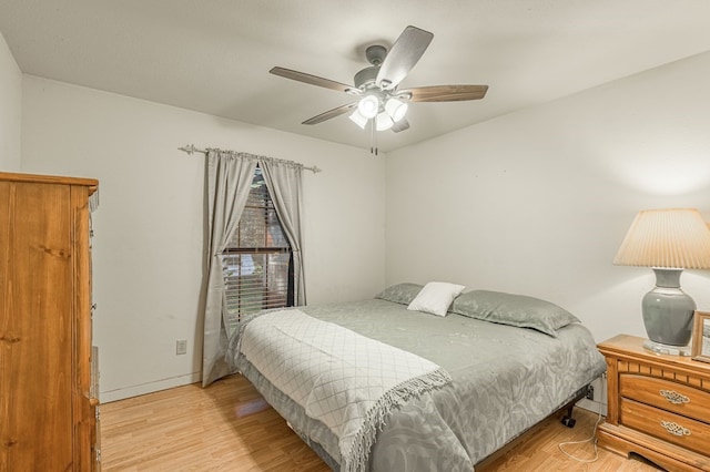 bedroom featuring ceiling fan and light hardwood / wood-style floors