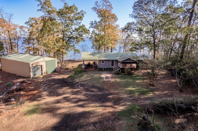 exterior space with an outdoor structure and a garage