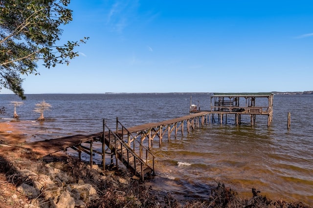 view of dock with a water view