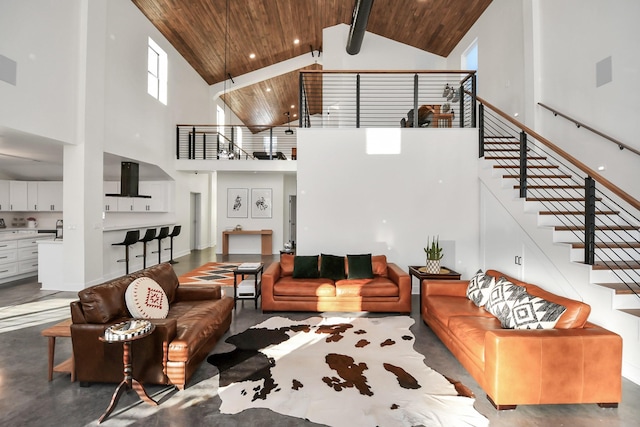 living room with concrete flooring, high vaulted ceiling, and wood ceiling