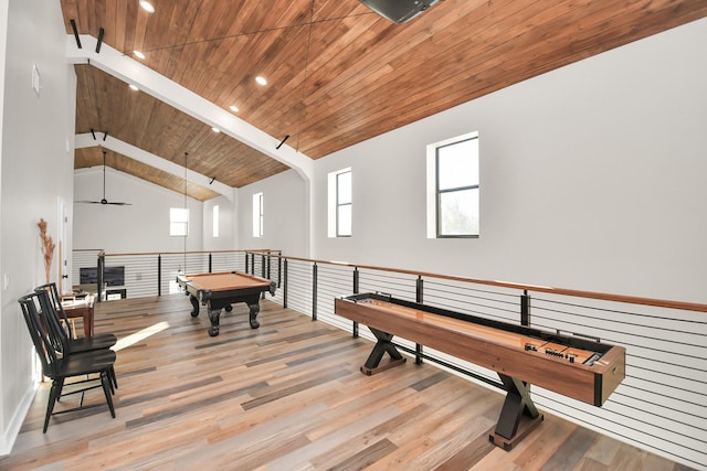 recreation room featuring light wood-type flooring, ceiling fan, wooden ceiling, vaulted ceiling with beams, and pool table