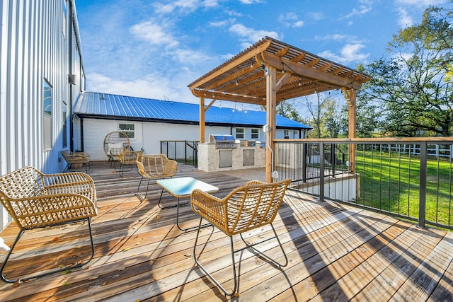 wooden terrace with a yard, area for grilling, grilling area, and a pergola