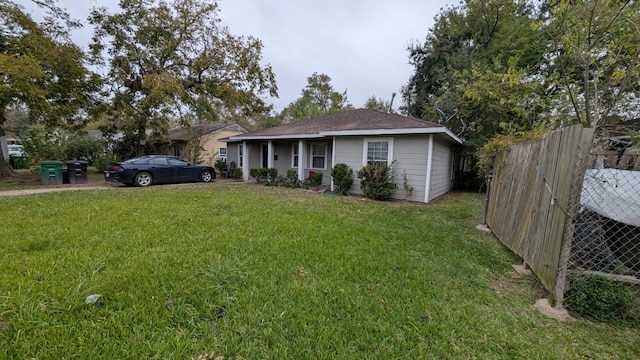 ranch-style house with a front yard