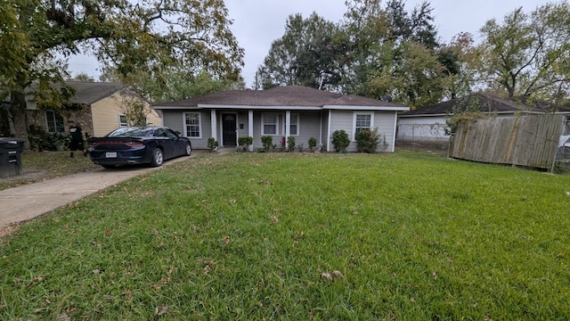 single story home featuring a front yard