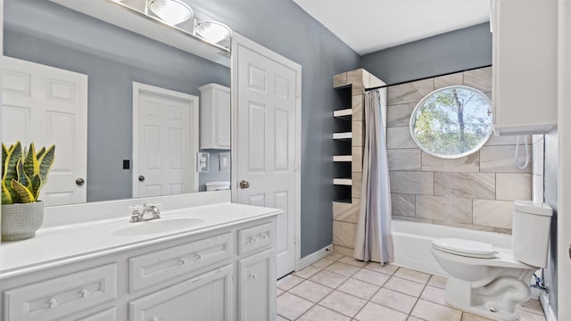 full bathroom featuring tile patterned flooring, vanity, toilet, and shower / bathtub combination with curtain