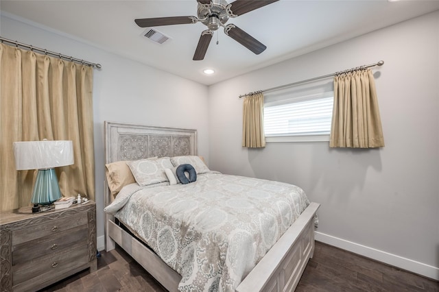 bedroom featuring ceiling fan and dark hardwood / wood-style flooring