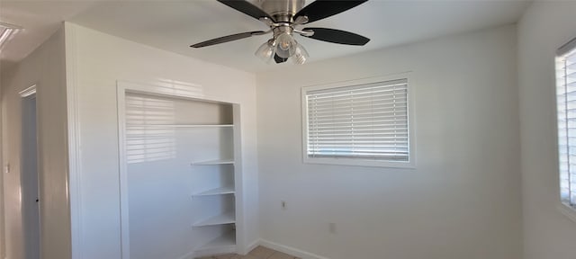 interior space featuring a closet and ceiling fan