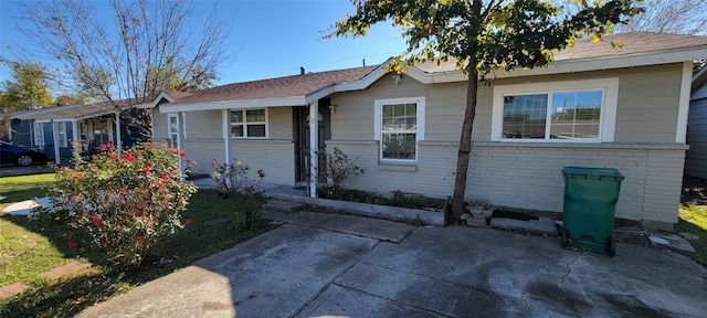 view of front of property featuring a patio area