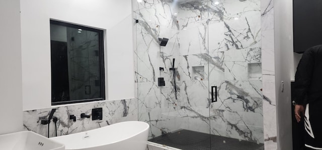 bathroom featuring tile walls and plus walk in shower