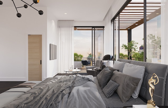 bedroom featuring access to exterior and dark hardwood / wood-style floors