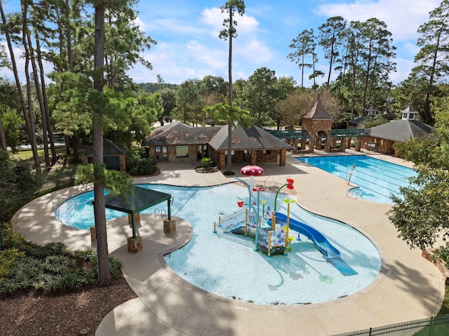 view of pool featuring a patio