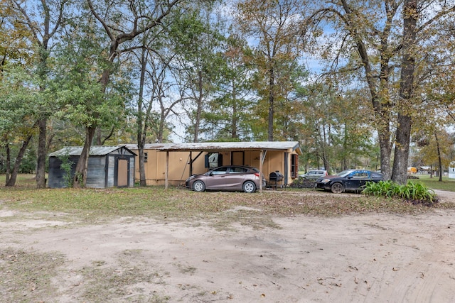 exterior space with a carport