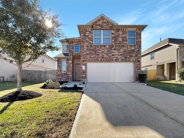 view of property with a front yard and a garage