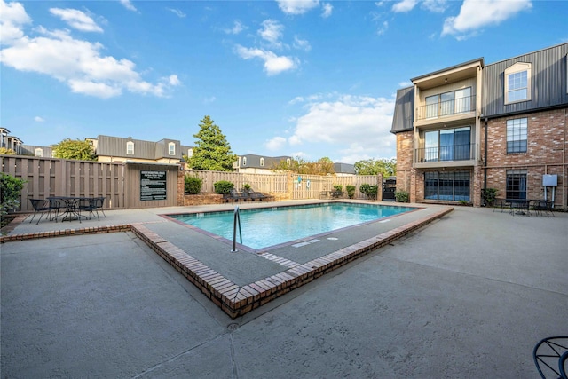 view of pool with a patio area