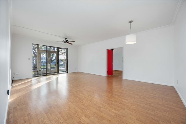 unfurnished room featuring ceiling fan, light hardwood / wood-style floors, and crown molding