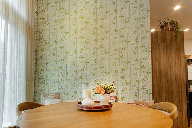 dining area with wallpapered walls