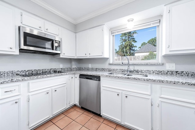 kitchen with white cabinetry, sink, and appliances with stainless steel finishes