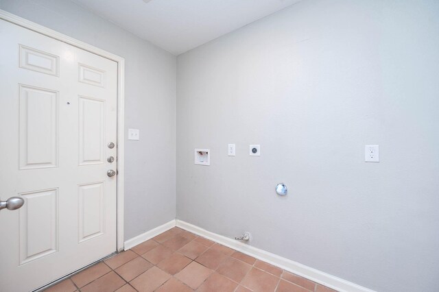 clothes washing area featuring electric dryer hookup, hookup for a gas dryer, light tile patterned floors, and washer hookup