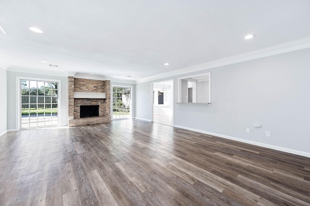 unfurnished living room with dark hardwood / wood-style flooring, plenty of natural light, and ornamental molding