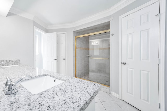 bathroom with vanity, tile patterned floors, an enclosed shower, and ornamental molding