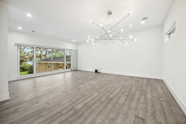 unfurnished living room with light wood-type flooring