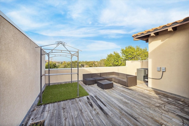 deck featuring a gazebo, central AC, and an outdoor living space