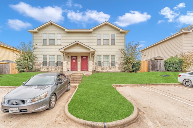 view of front of house with a front lawn