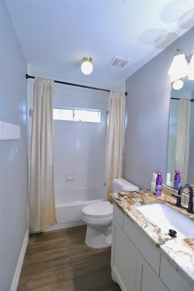 full bathroom featuring shower / bath combination with curtain, toilet, wood-type flooring, and vanity