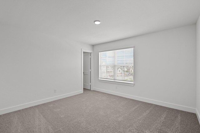 21710 Persian Lake Dr, Cypress, TX 77433 - carpeted spare room with baseboards