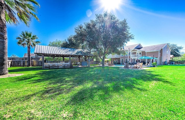 view of community with a gazebo and a lawn