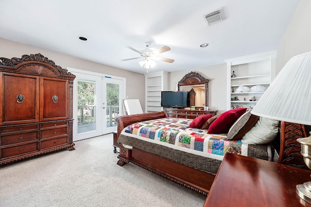 bedroom with light carpet, french doors, access to outside, and ceiling fan