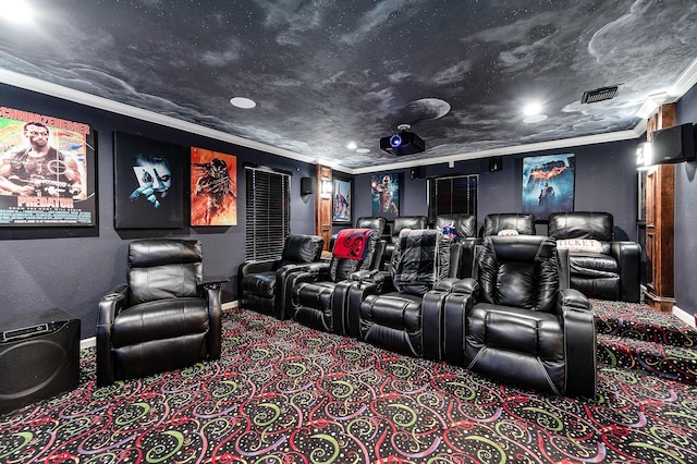 carpeted home theater room featuring a textured ceiling and crown molding