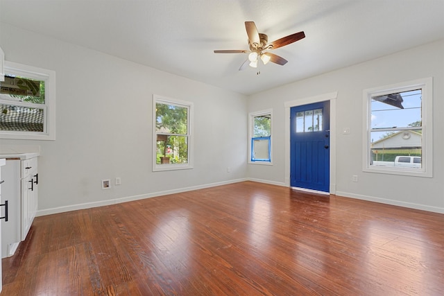 foyer featuring dark hardwood / wood-style floors and ceiling fan