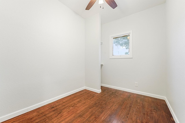 spare room with ceiling fan and wood-type flooring