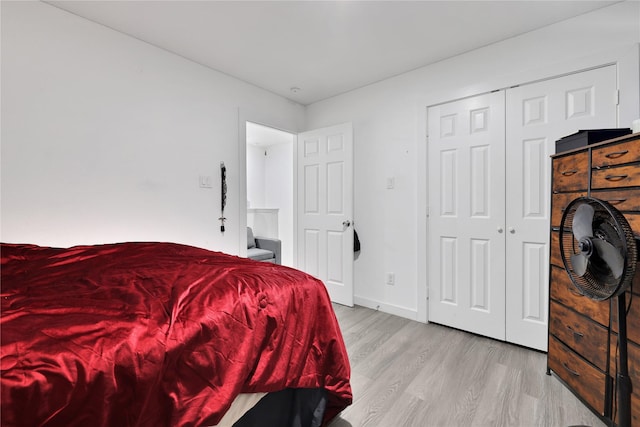 bedroom with light hardwood / wood-style flooring