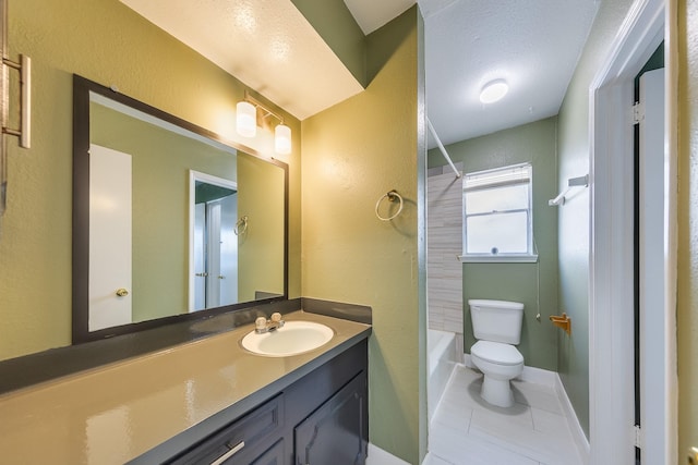 bathroom with vanity, a textured ceiling, toilet, and tile patterned flooring