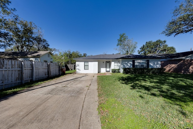 ranch-style house with a front yard