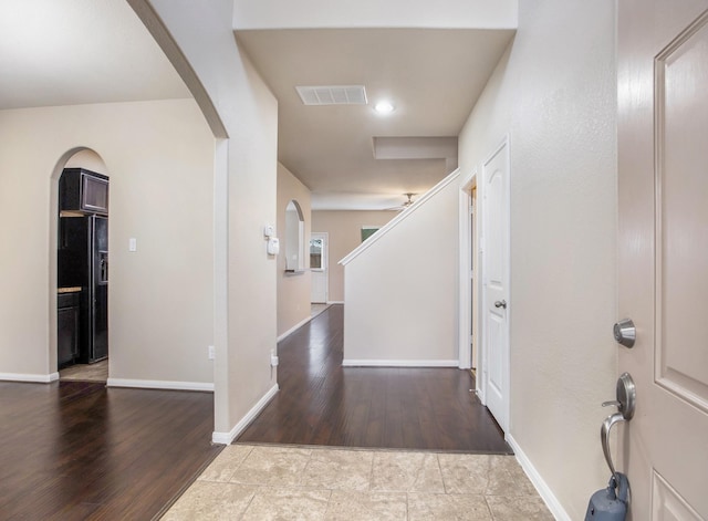 corridor featuring light wood-type flooring