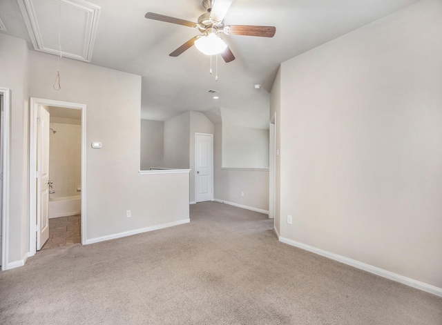 carpeted empty room featuring ceiling fan