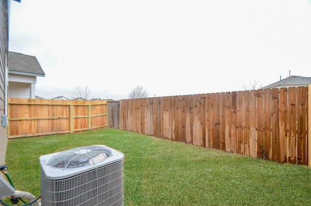 view of yard featuring central AC