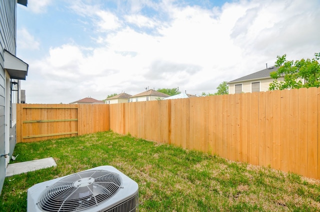 14983 Eagle Feather Dr, Houston, TX 77090 - view of yard with a fenced backyard and cooling unit
