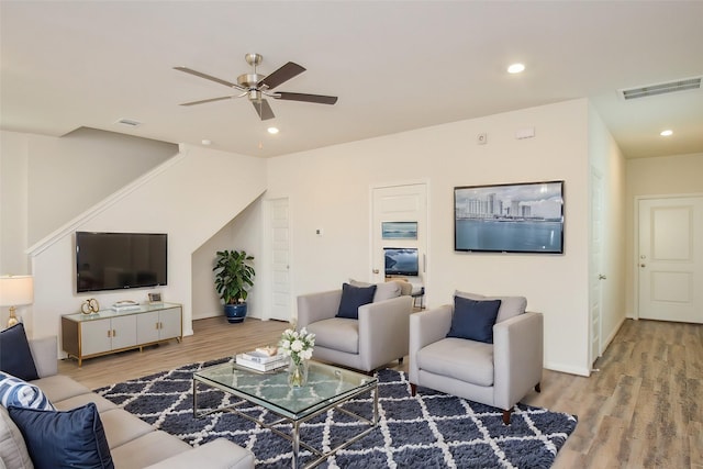 14983 Eagle Feather Dr, Houston, TX 77090 - living room featuring recessed lighting, wood finished floors, visible vents, and a ceiling fan