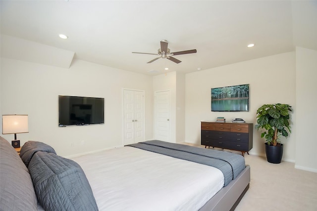 14983 Eagle Feather Dr, Houston, TX 77090 - bedroom featuring light colored carpet, baseboards, a ceiling fan, and recessed lighting