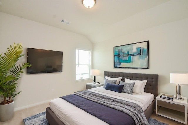 14983 Eagle Feather Dr, Houston, TX 77090 - carpeted bedroom featuring vaulted ceiling, visible vents, and baseboards