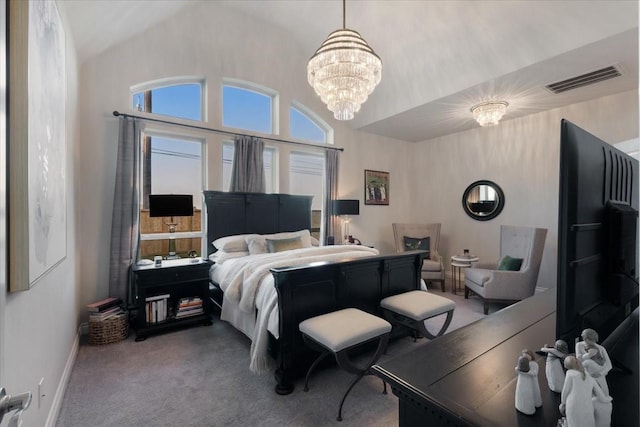 carpeted bedroom featuring vaulted ceiling and an inviting chandelier